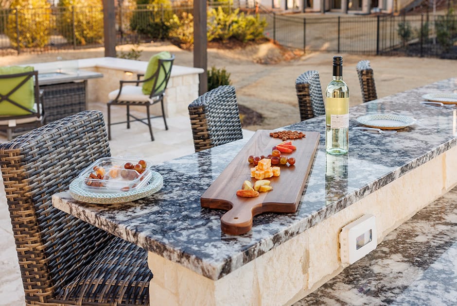 How to Style an Outdoor Bar That Functions in All Seasons